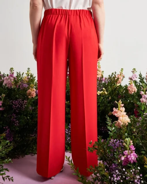Pantalone a gamba larga in cady elasticizzato tinta unita. PAPAVERO
